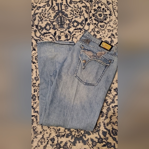 Robin's jeans killer distressed rhinestones stud pocket.